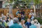 A bluegrass band performing in an outdoor space.